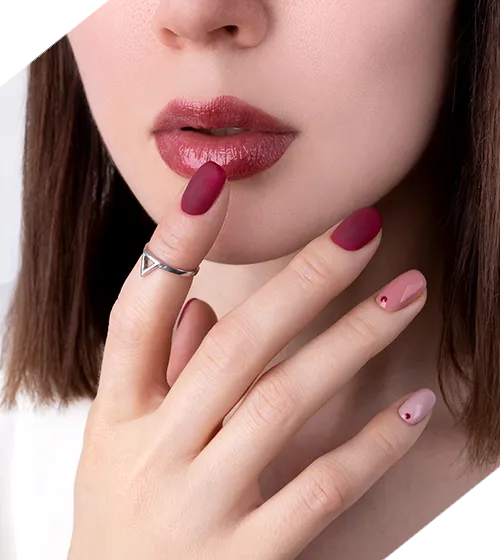 beautiful woman with pink manicure minimal style with jewelry