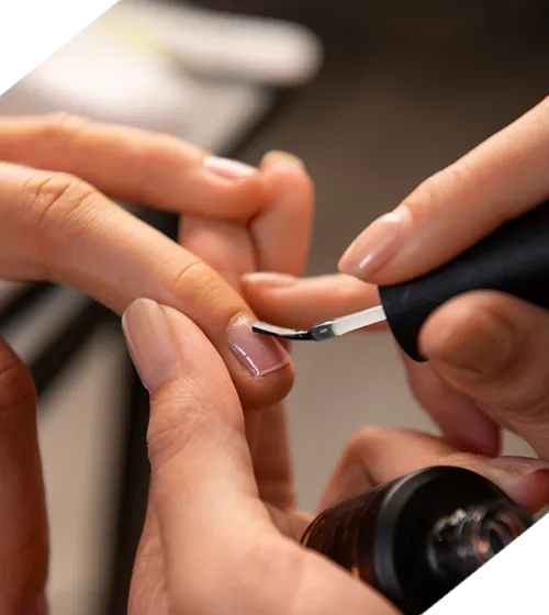 woman getting manicure high angle